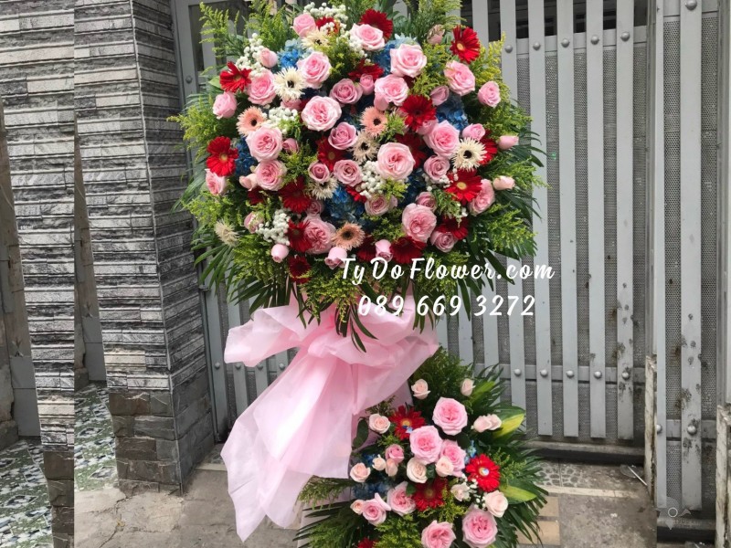 KCM01241308 KỆ HOA CHÚC MỪNG TẤT NIÊN thiết kế tone màu hồng, chủ đạo Hoa Hồng Ohara Pink Roses