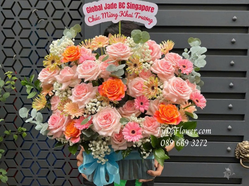 G0925693 GIỎ HOA CHÚC MỪNG KHAI TRƯƠNG Thiết kế hoa hồng Pink Ohara, cam Spirit, đồng tiền mini
