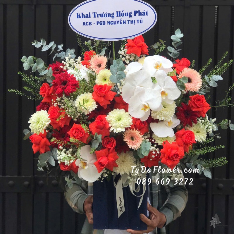 G11242070 GIỎ HOA CHÚC MỪNG KHAI TRƯƠNG HỒNG PHÁT Thiết kế Hoa Hồng Đỏ Cam, Lan Hồ Điệp Trắng