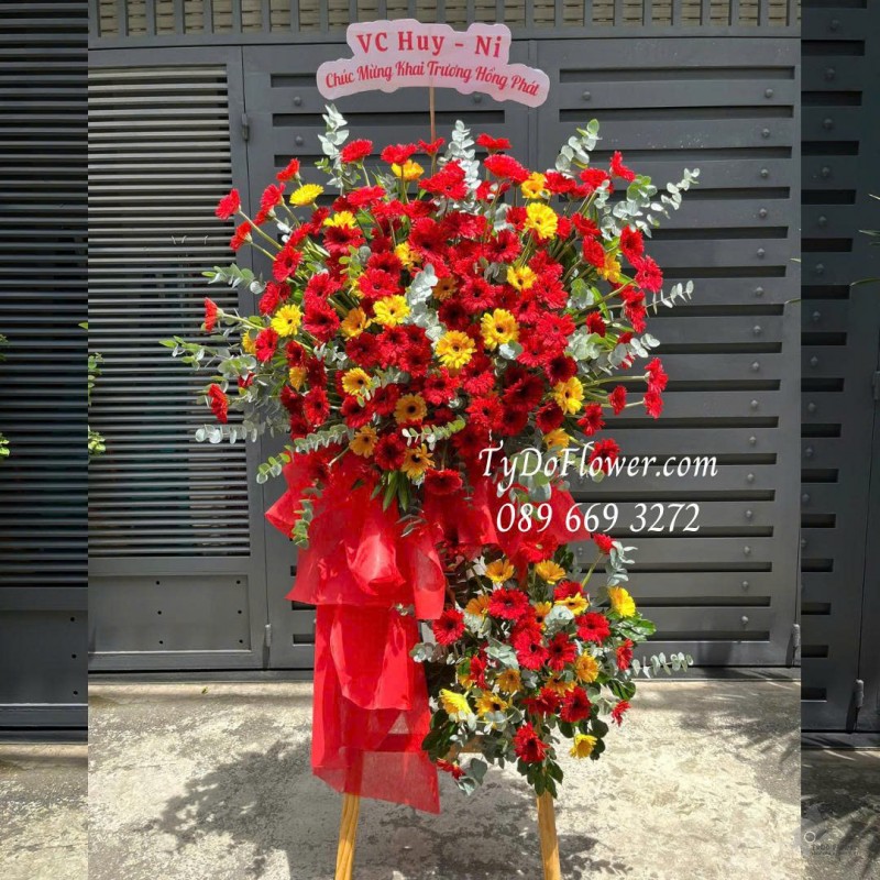 KCM0725505 KỆ HOA CHÚC MỪNG KHAI TRƯƠNG HỒNG PHÁT Thiết kế hoa đồng tiền